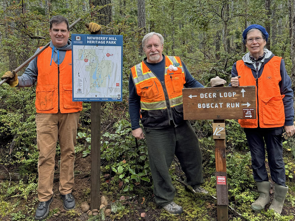 L to R Eric,Tom,Nancy Scott (behind camera) Signs
